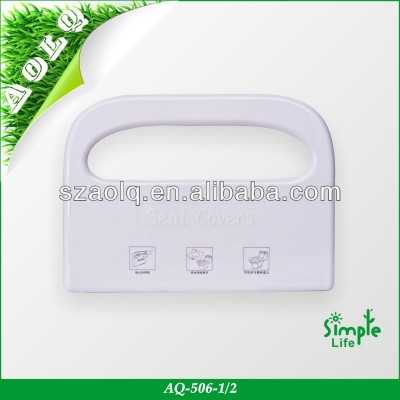 Plastic dispenser for disposable toilet paper seat cover